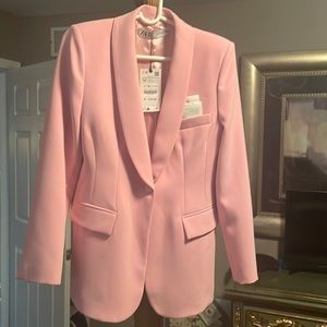 Beautiful Barbie pink fitted blazer. Perfect for work or jeans.